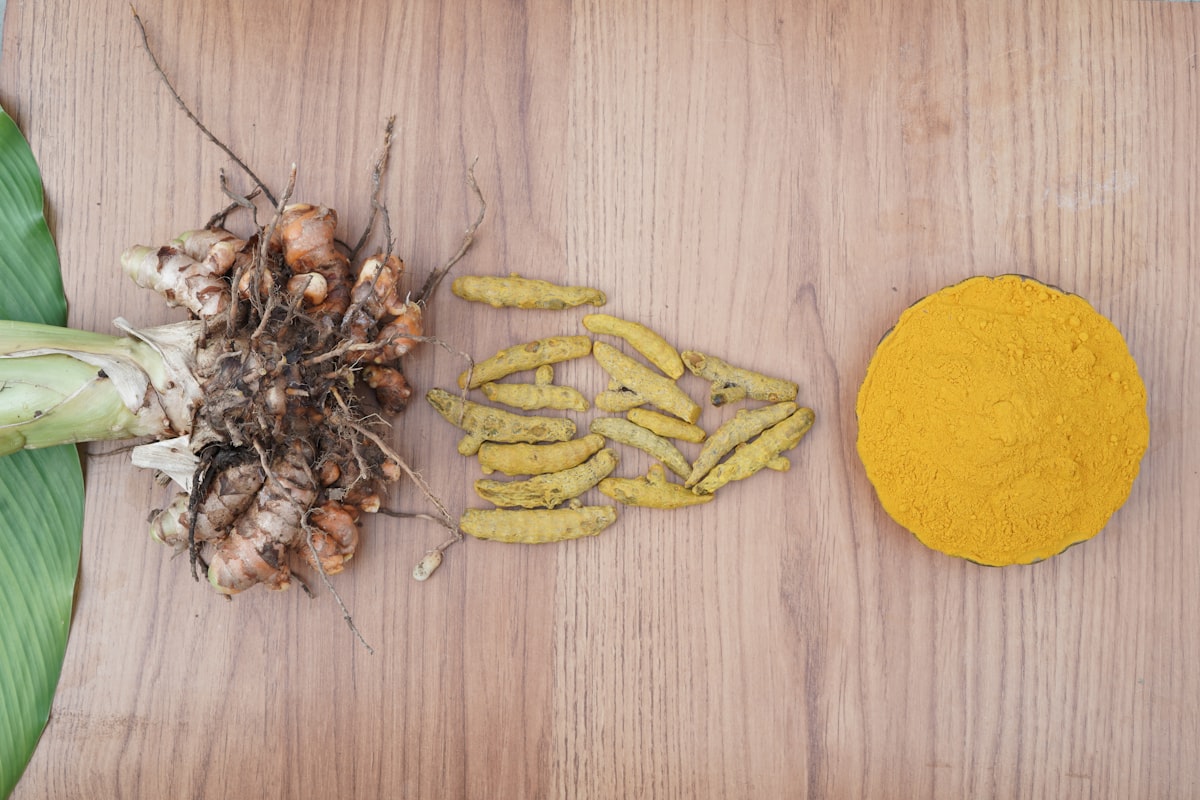 Turmeric-ginger soup with coconut milk and fresh herbs